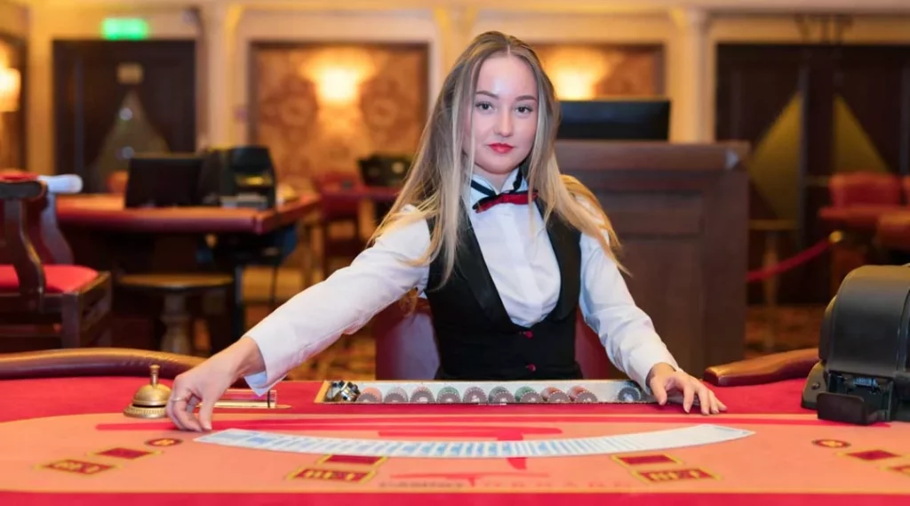 Dealer tại casino 1xBet chuyên nghiệp, quyến rũ